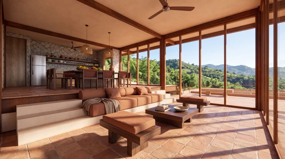 Sala abierta con estar hundido, pisos en barro cocido, cocina con muro en piedra y ventanal de piso a techo hacia las montañas